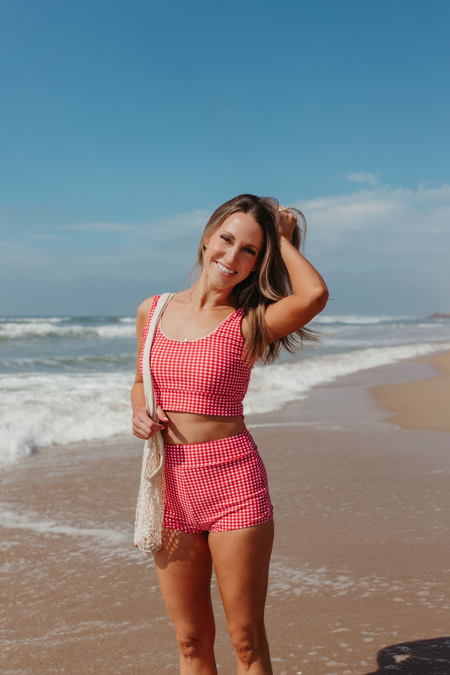 BEACHCOMBER SPORTY SWIM TOP IN RED GINGHAM BY PINK DESERT