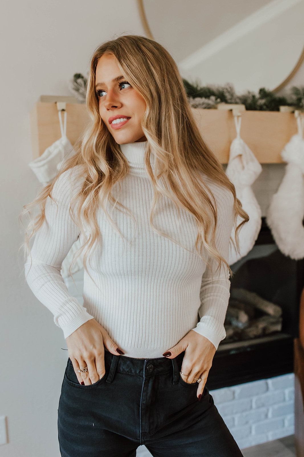 THE LUCIE TURTLENECK RIBBED SWEATER IN IVORY