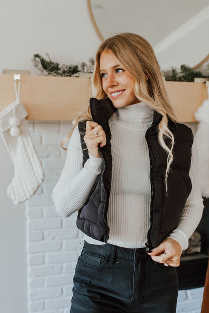 THE LUCIE TURTLENECK RIBBED SWEATER IN IVORY