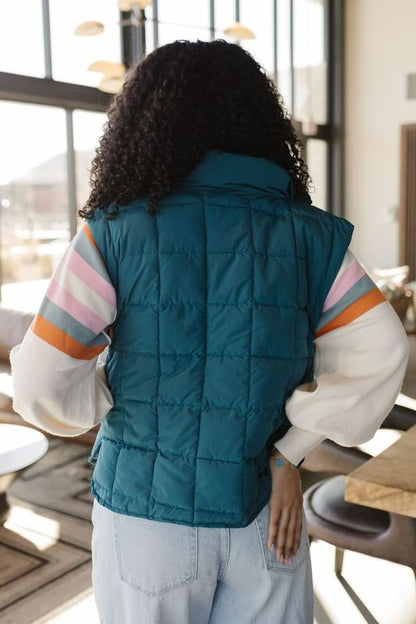 THE VERITY SOLID PUFFER VEST IN SEA FOAM