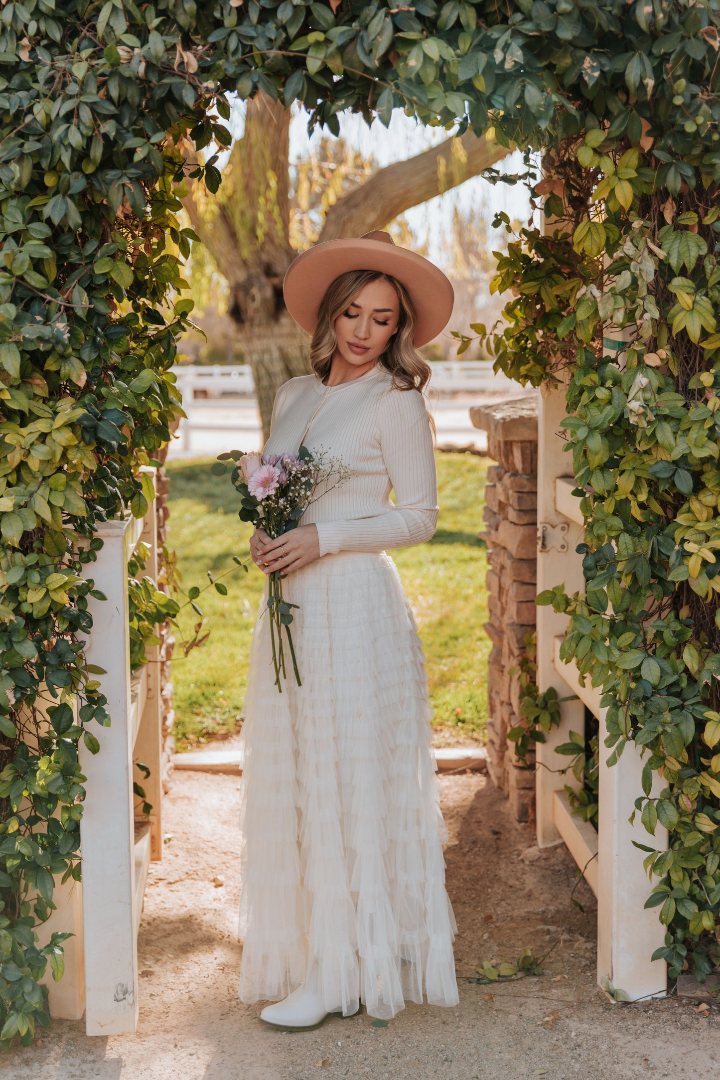 THE CASCADE TULLE TIERED MIDI SKIRT IN CREAM