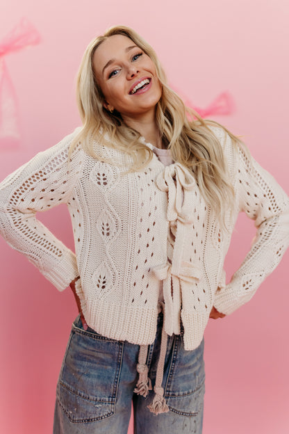 THE FANNIE KNIT TIE FRONT CARDIGAN IN CREAM