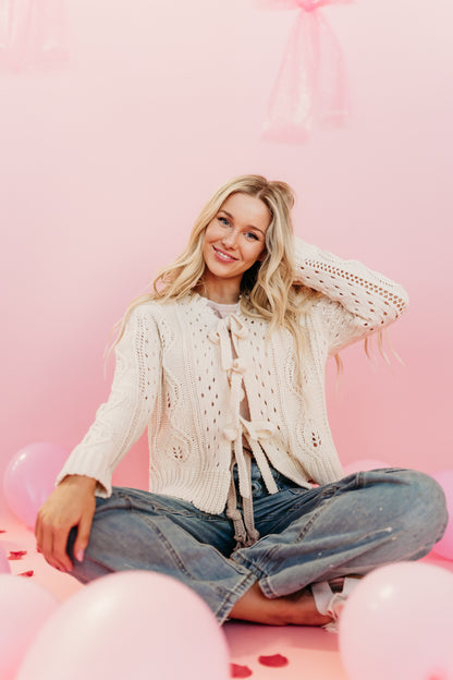 THE FANNIE KNIT TIE FRONT CARDIGAN IN CREAM