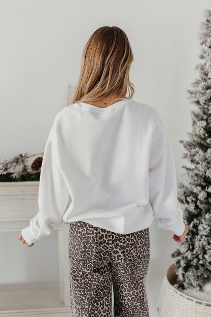 THE EMBROIDERED HOLIDAY BOW PULLOVER IN WHITE