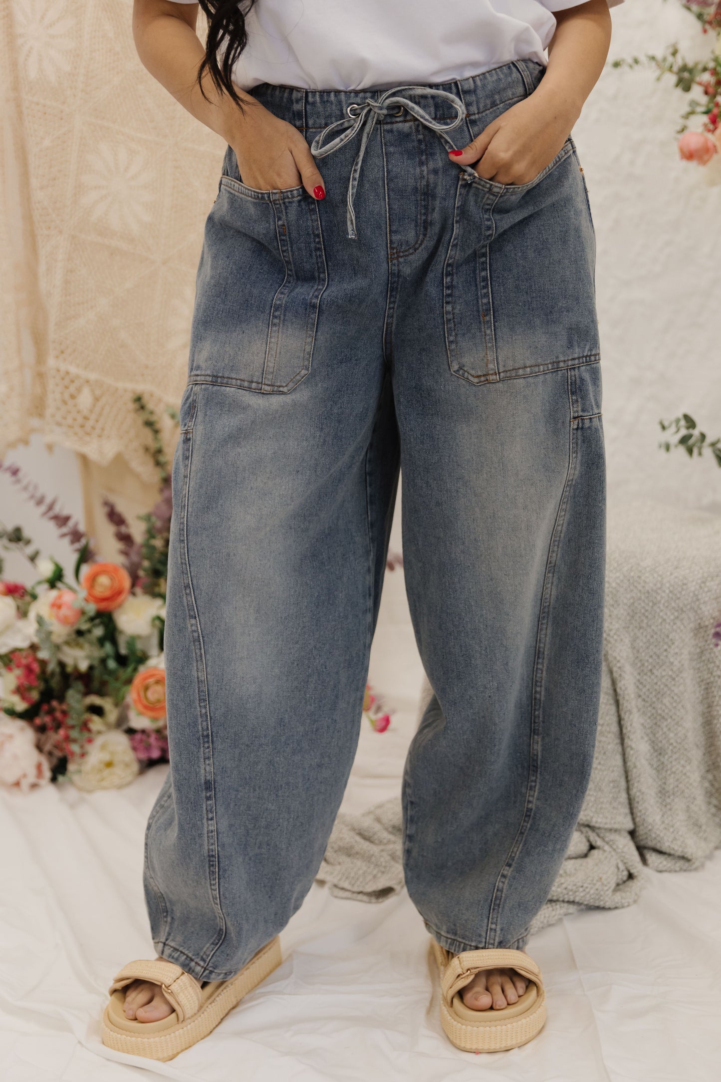 THE LOLA MID RISE JEANS IN LIGHT DENIM