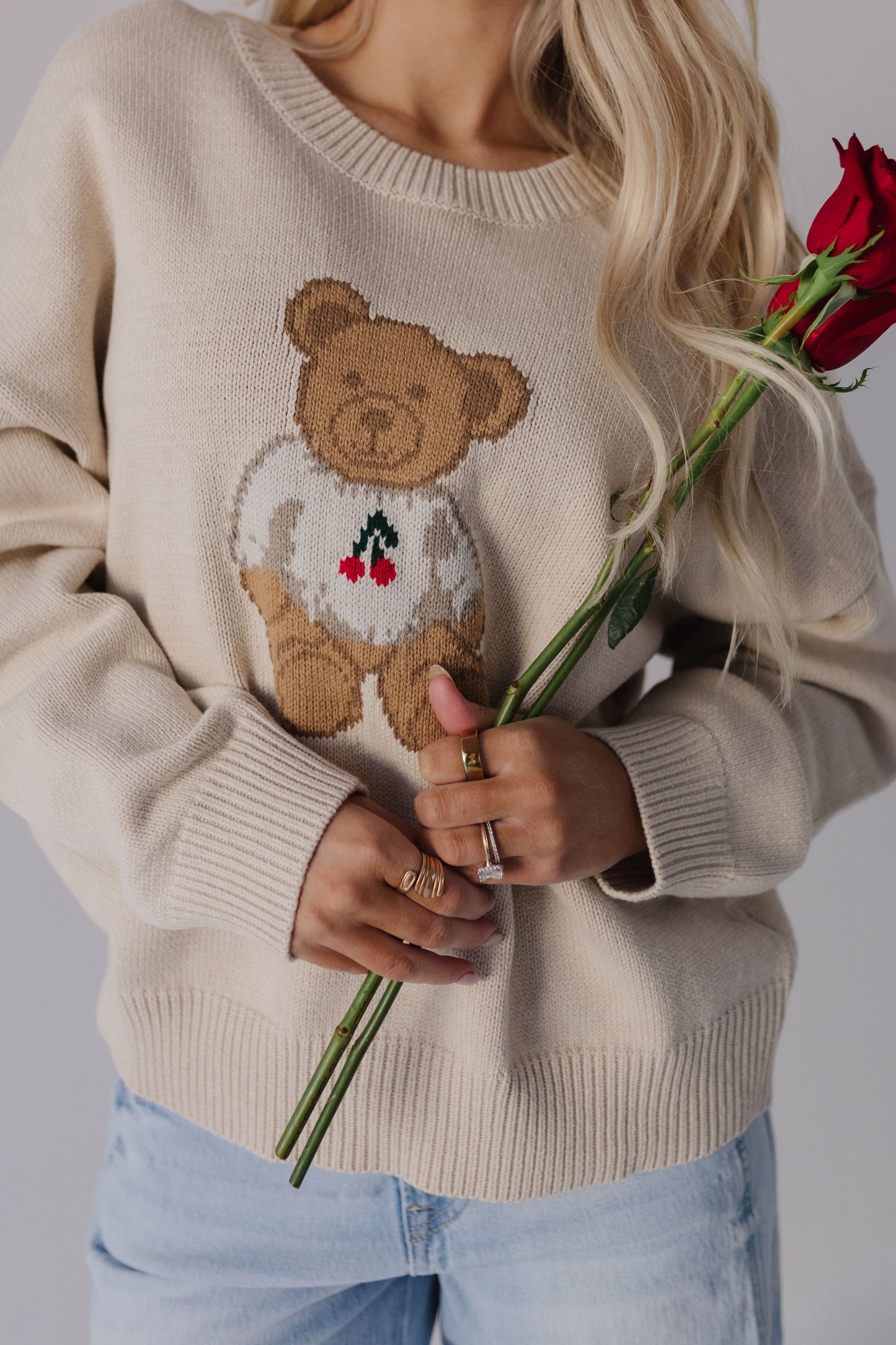 THE TEDDY BEAR CHERRY SWEATER IN CREAM