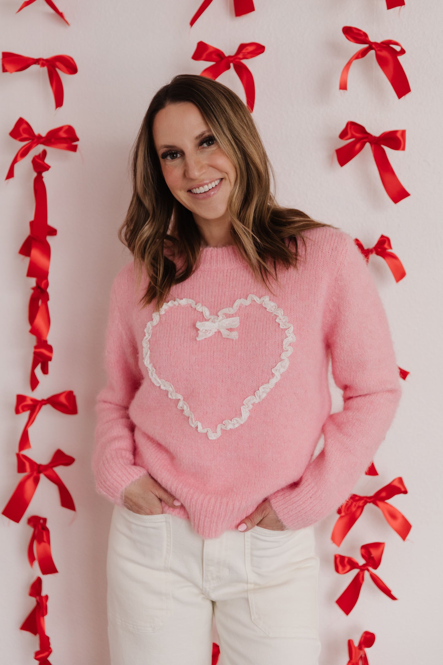 THE VALLORIE HEART SWEATER IN PINK