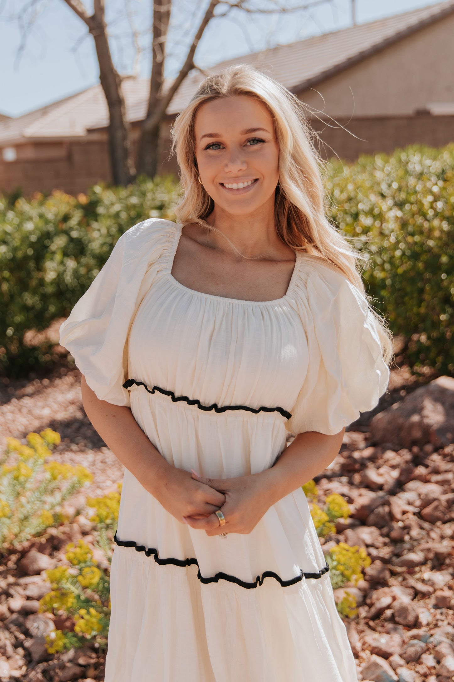 THE IRELYN RUFFLED MAXI DRESS IN IVORY