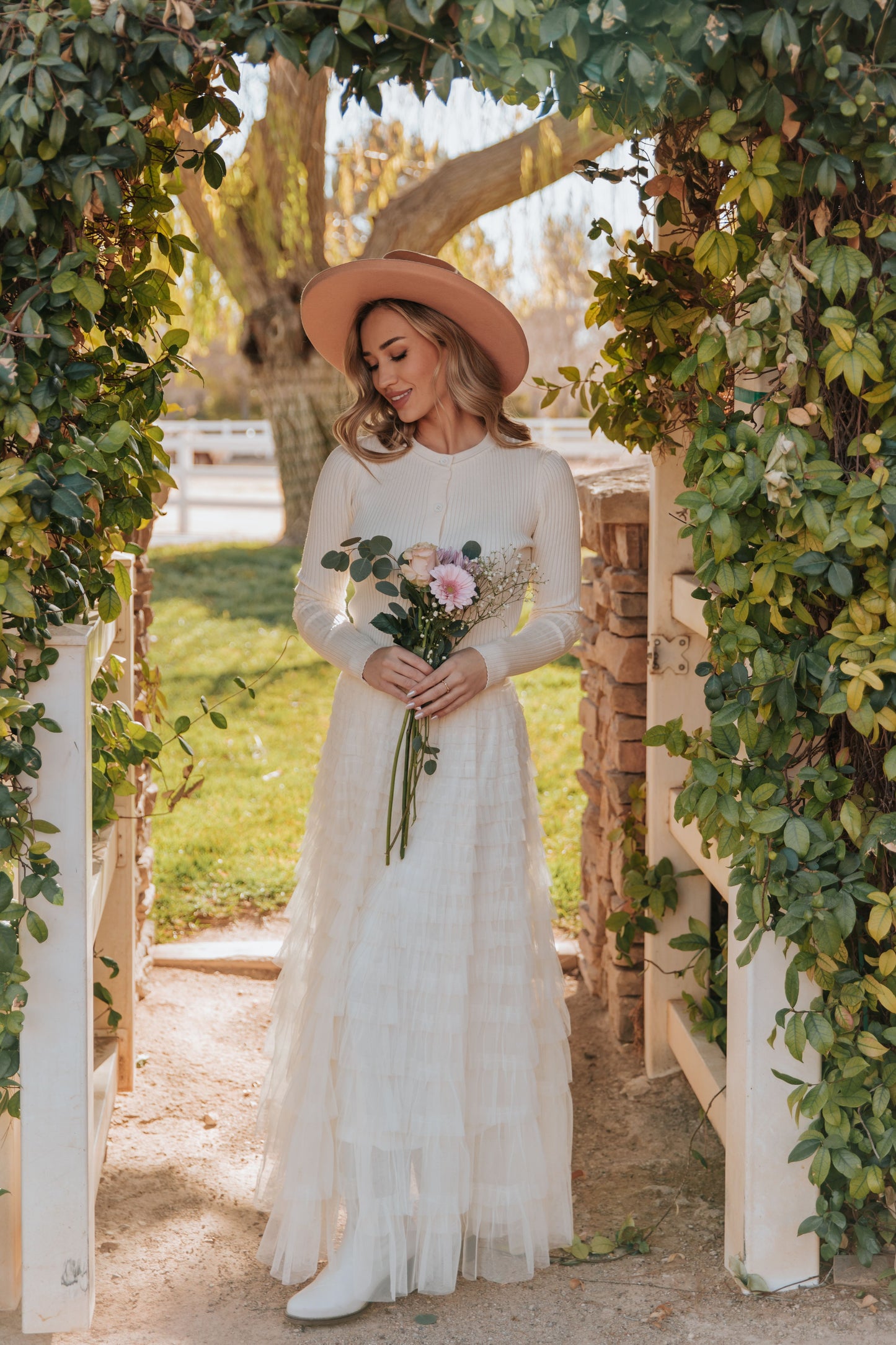 THE CASCADE TULLE TIERED MIDI SKIRT IN CREAM