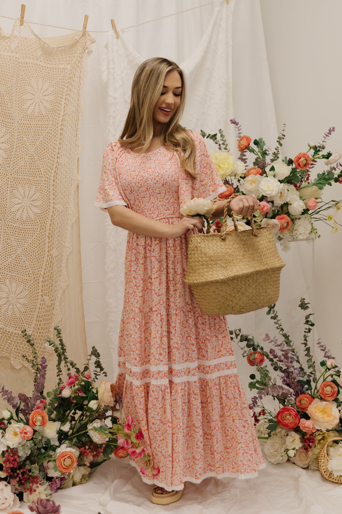 THE DANA SMOCKED MAXI DRESS IN CORAL