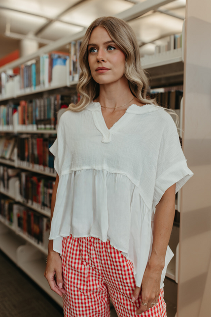 THE RENEE RUFFLE HEM TUNIC IN OFF WHITE