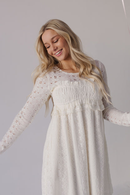 THE CALIANA CROCHET MINI BABYDOLL DRESS IN CREAM