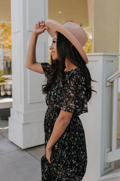 THE MEADOW PLEATED FLORAL MIDI DRESS IN BLACK