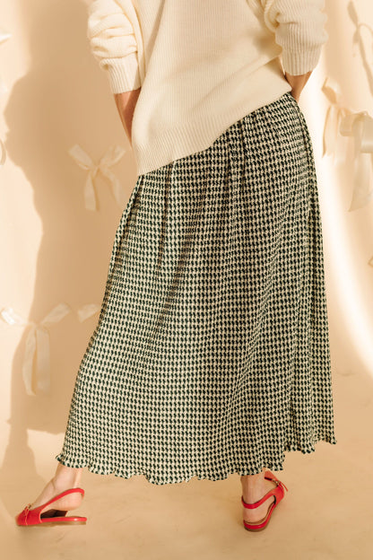 THE PRIM HOUNDSTOOTH MIDI SKIRT IN GREEN