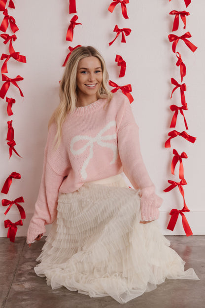 THE BREAUNA BIG RIBBON PULLOVER IN PINK