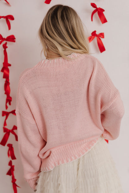 THE BREAUNA BIG RIBBON PULLOVER IN PINK