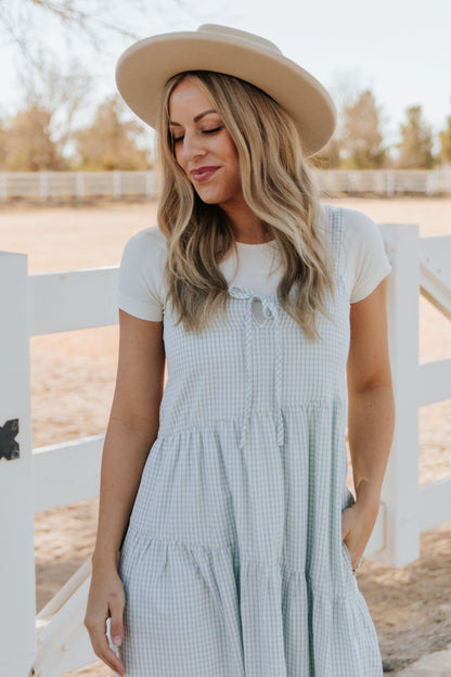 THE ALORA ASYMMETRICAL MIDI DRESS IN BLUE PLAID