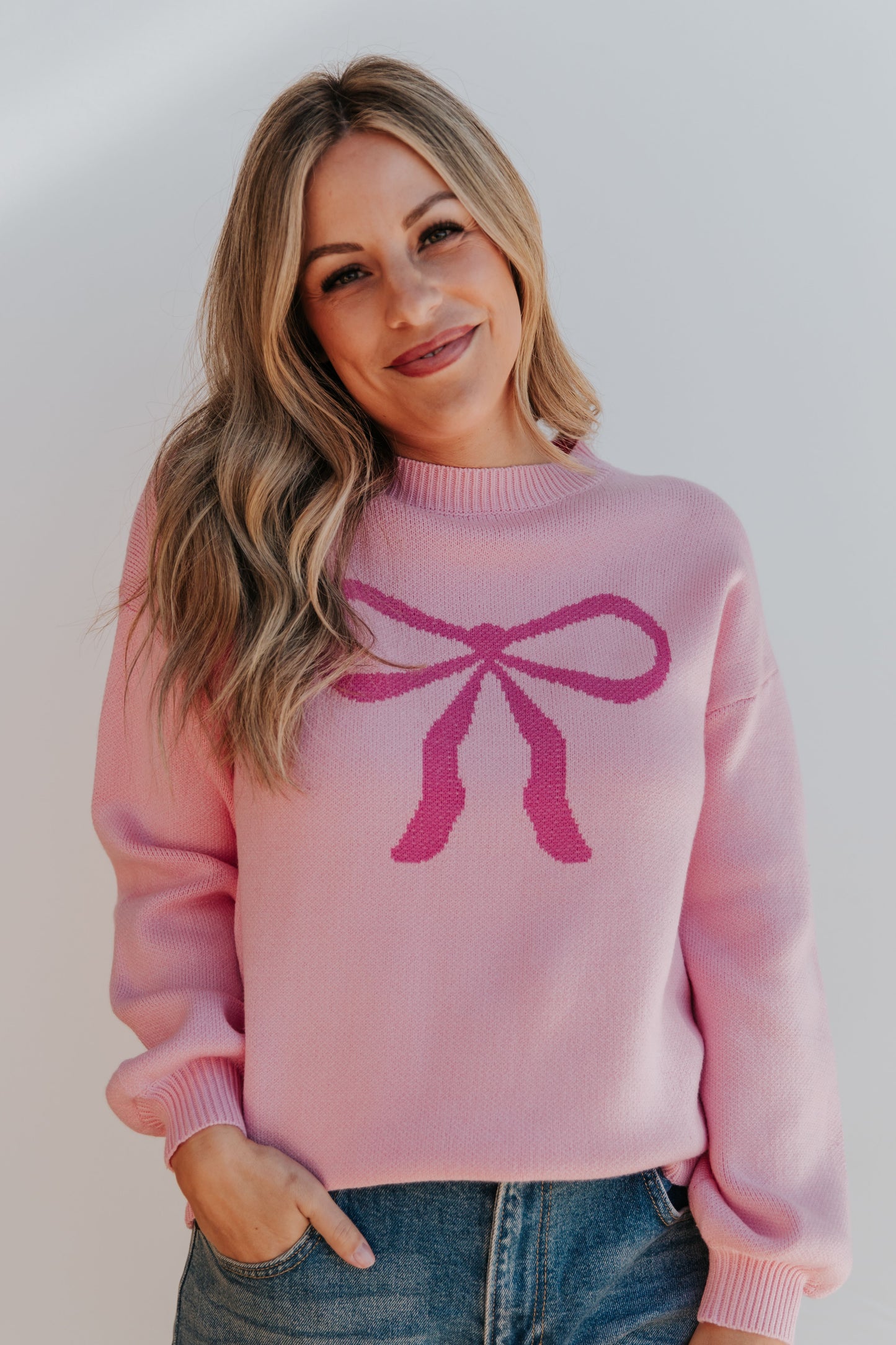 THE SALOME BOW TIE SWEATER IN PINK