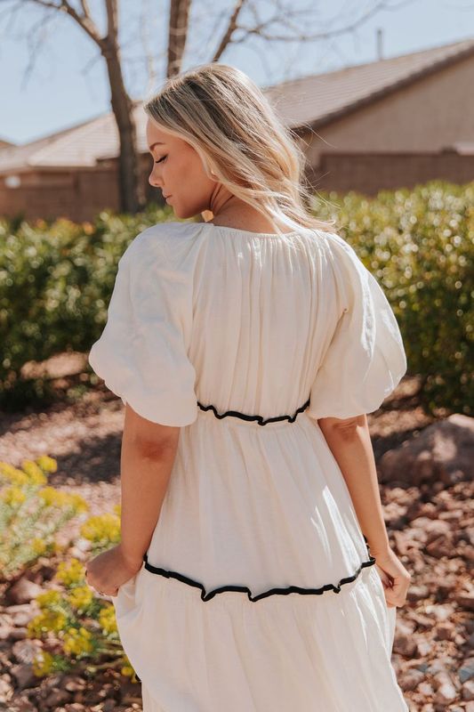 THE IRELYN RUFFLED MAXI DRESS IN IVORY