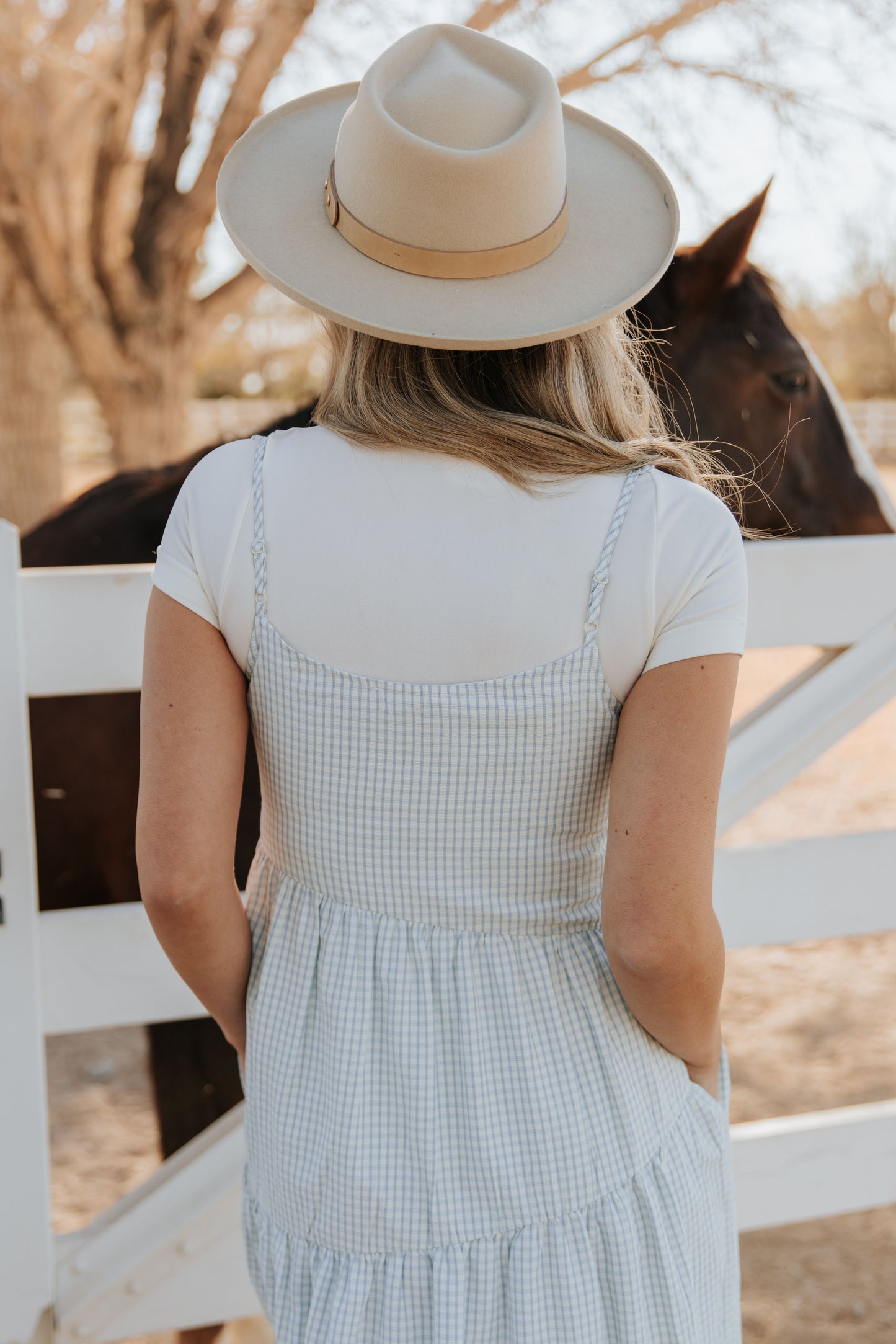 THE ALORA ASYMMETRICAL MIDI DRESS IN BLUE PLAID