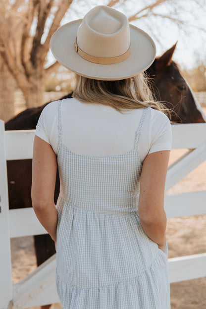 THE ALORA ASYMMETRICAL MIDI DRESS IN BLUE PLAID