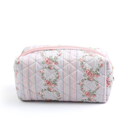 THE QUILTED FLORAL COSMETIC BAG