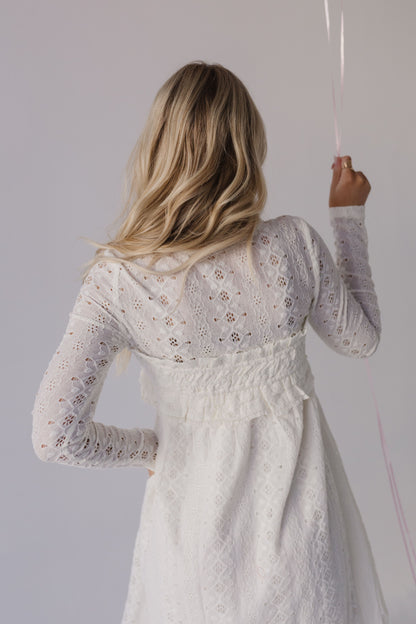 THE CALIANA CROCHET MINI BABYDOLL DRESS IN CREAM