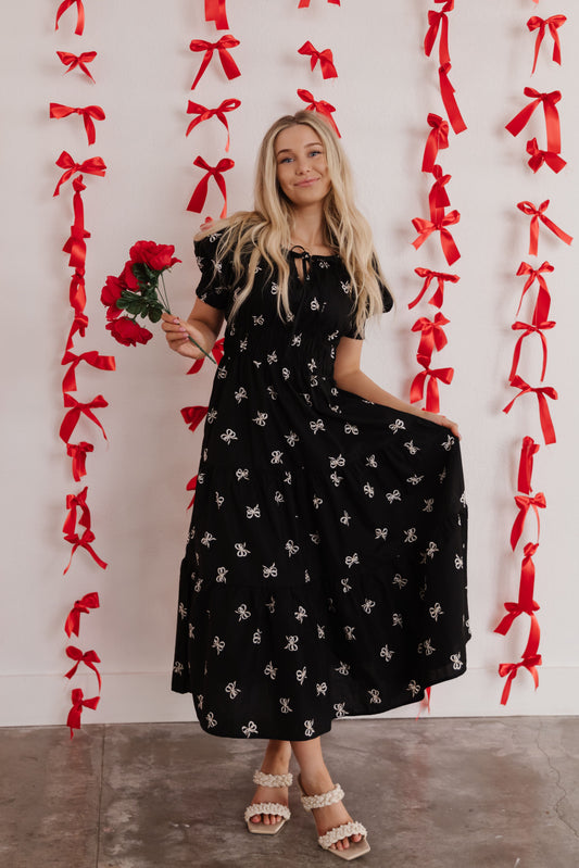 THE BEDA BOW MIDI DRESS IN BLACK