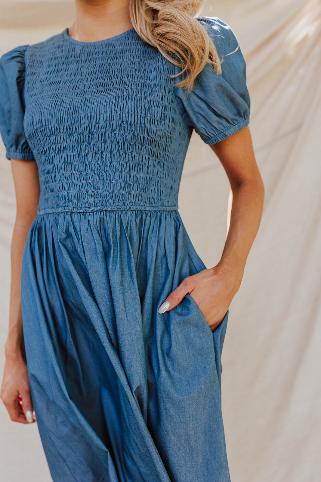 THE KENNEDY SMOCKED DRESS IN CHAMBRAY BY PINK DESERT