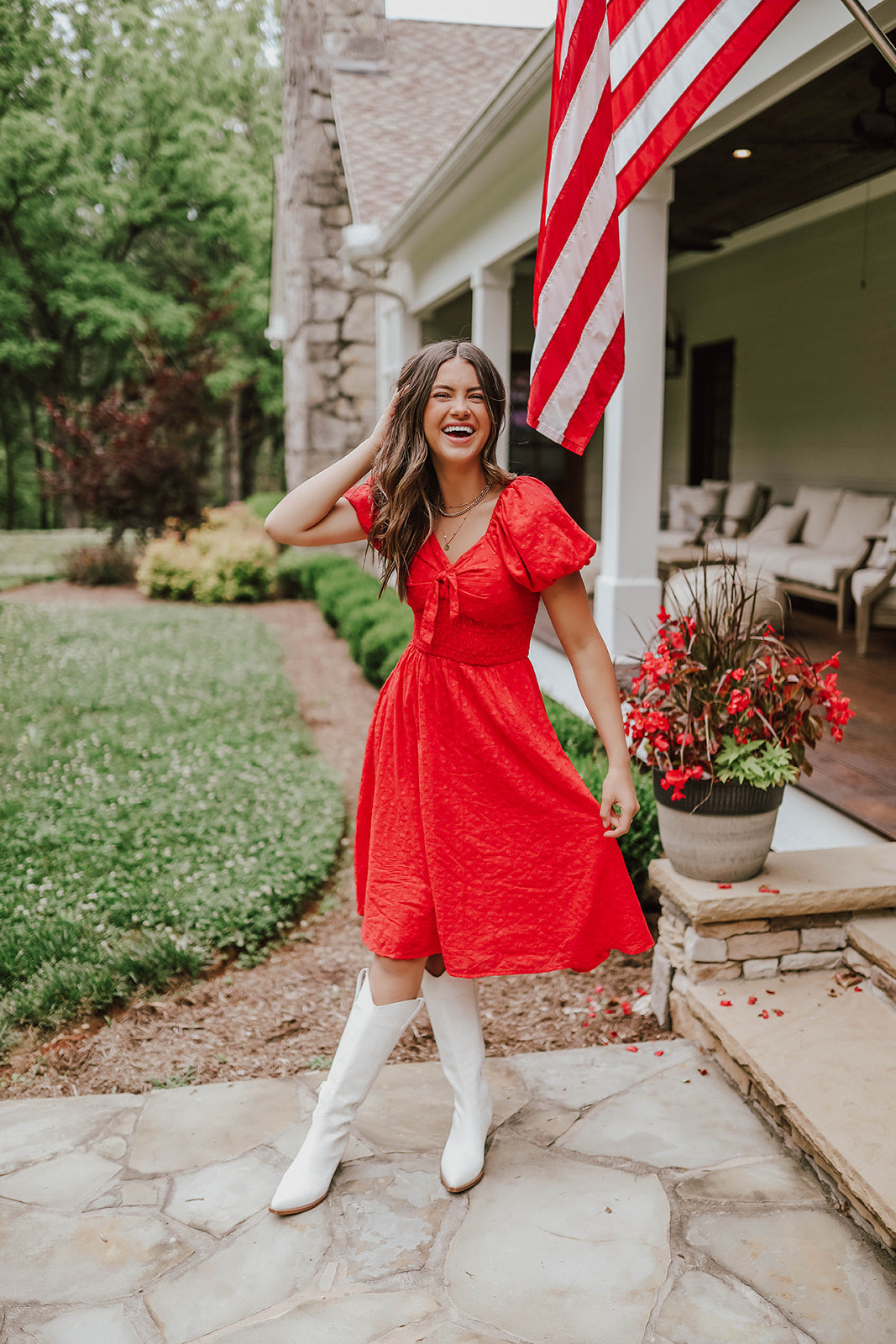 THE BETSY TIE FRONT EMBROIDERED DRESS IN RED BY PINK DESERT