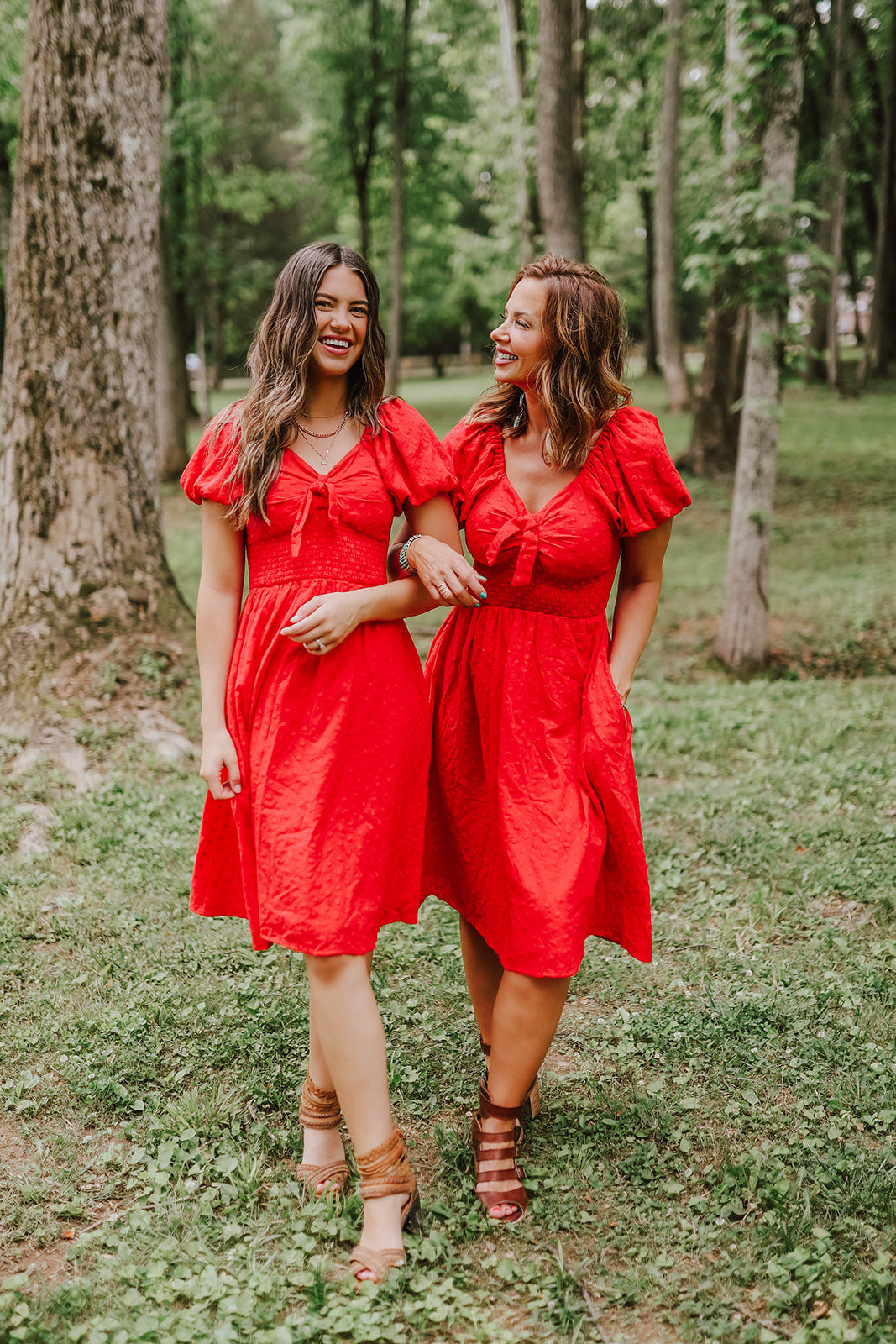 THE BETSY TIE FRONT EMBROIDERED DRESS IN RED BY PINK DESERT