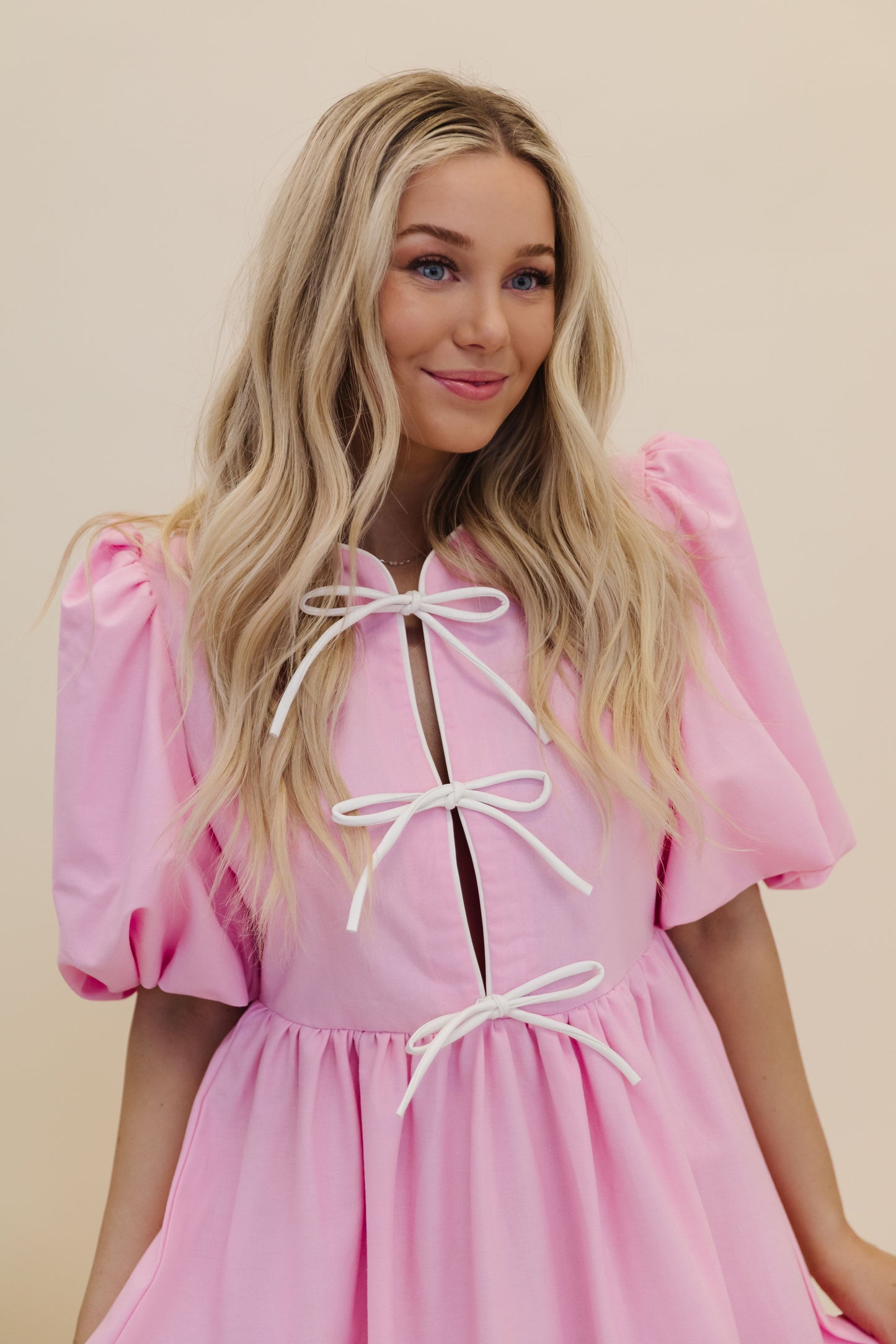 THE JOSEPHINE BOW TIE MIDI DRESS IN PINK