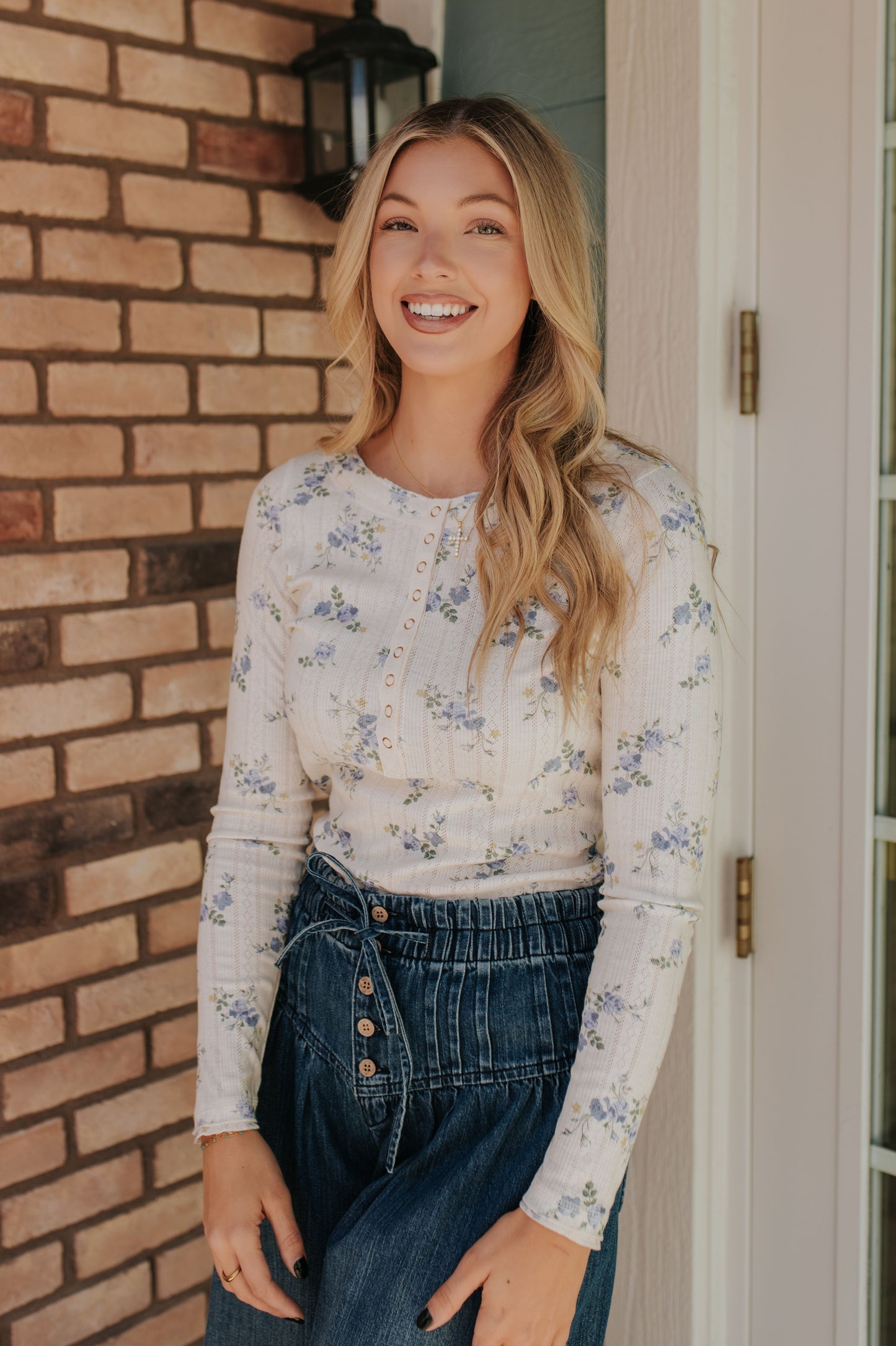 THE HATTIE FLORAL HENLEY LONG SLEEVE IN CORNFLOWER