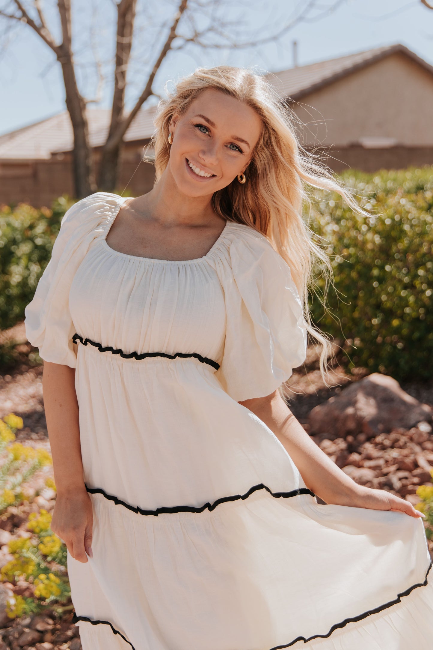 THE IRELYN RUFFLED MAXI DRESS IN IVORY