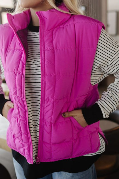 THE VERITY SOLID PUFFER VEST IN FUCHSIA