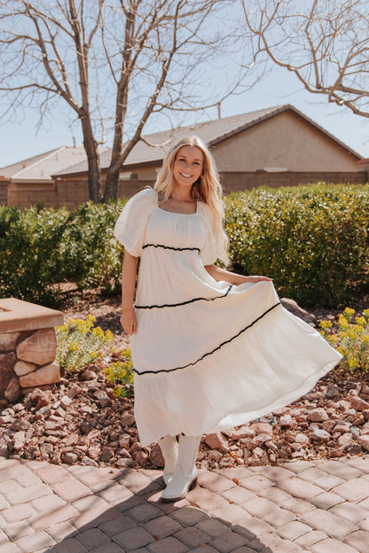 THE IRELYN RUFFLED MAXI DRESS IN IVORY