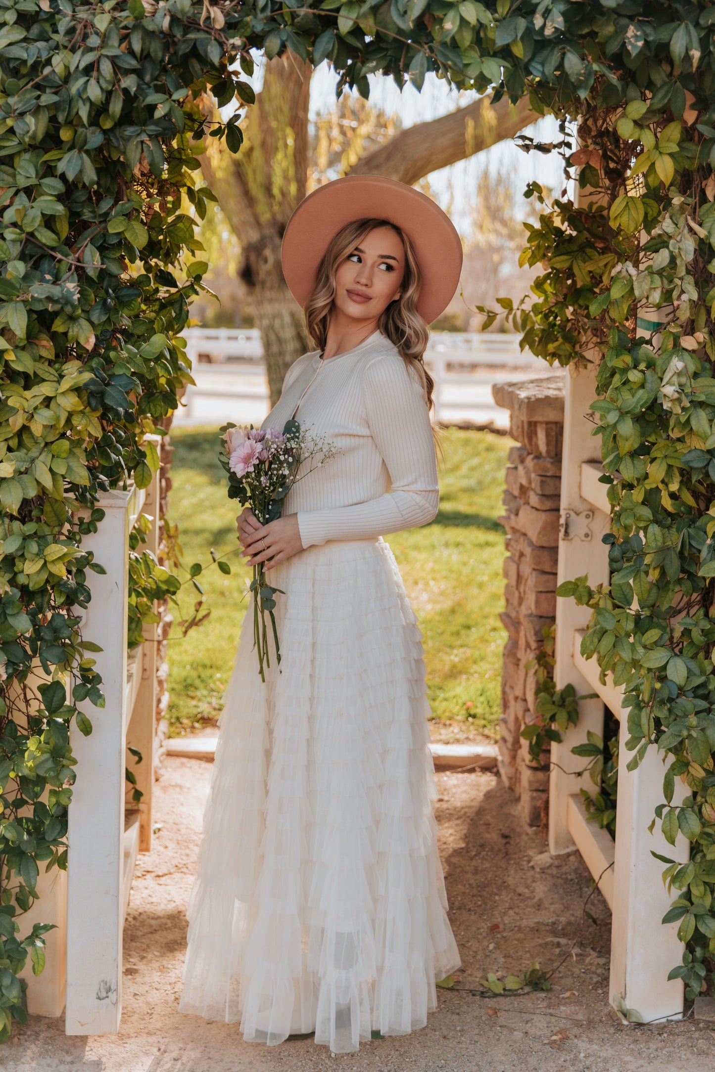 THE CASCADE TULLE TIERED MIDI SKIRT IN CREAM