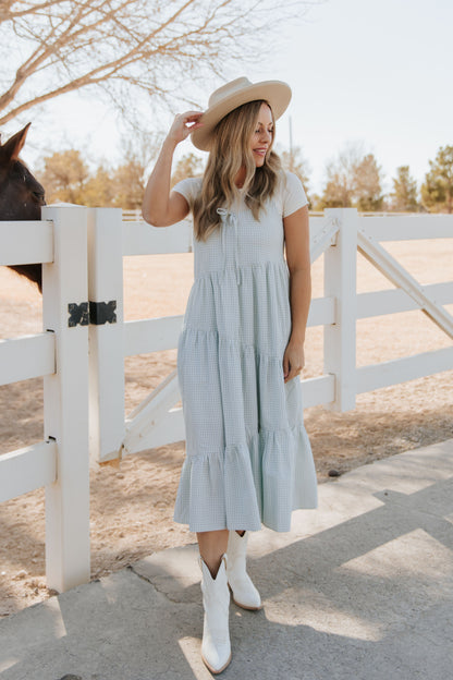 THE ALORA ASYMMETRICAL MIDI DRESS IN BLUE PLAID