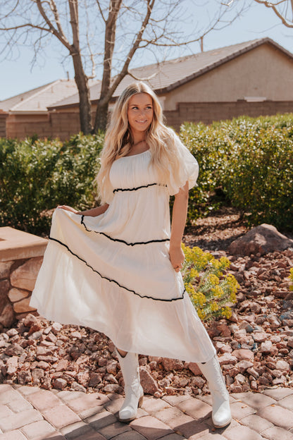 THE IRELYN RUFFLED MAXI DRESS IN IVORY