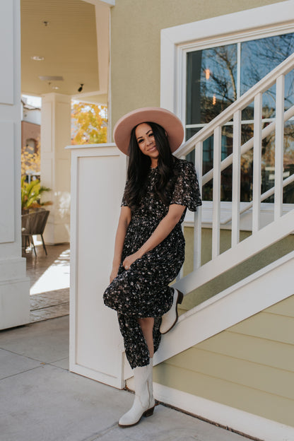 THE MEADOW PLEATED FLORAL MIDI DRESS IN BLACK