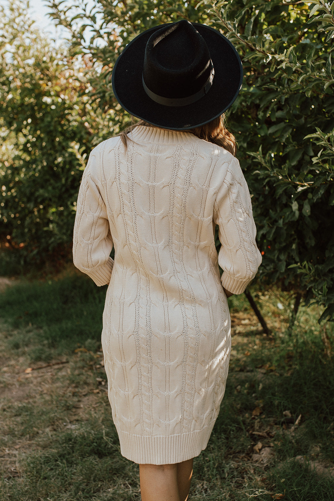 THE SWEATER WEATHER CABLE KNIT DRESS IN IVORY BY PINK DESERT